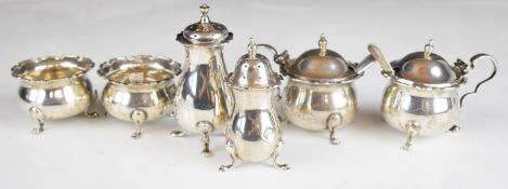 Hallmarked silver cruet set items comprising two each of pepper, salt and mustard, with three
