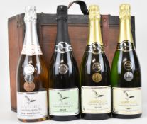 Four bottles of Daws Hill English sparkling wine comprising 2009 (12%), 2011 (12%), 2014 (7.5%)