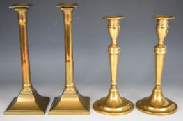 Two pairs of 19thC brass candlesticks, tallest 29cm