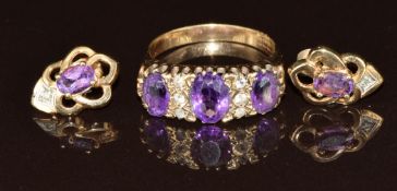 A 9ct gold ring set with amethysts, with similar earrings, 7g, size R