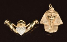 A 9ct gold pendant in the form of a pharaoh and a 9ct gold Claddagh pendant set with diamonds, 6g
