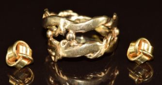 A 9ct gold abstract ring (4.6g, size P) and a pair of 9ct gold knot earrings (1.1g)