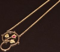 A 9ct gold c1915 necklace set with a synthetic ruby and foliate design, 4.9g, 47cm