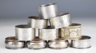 Ten Victorian and later hallmarked silver napkin rings including engine turned examples, weight of