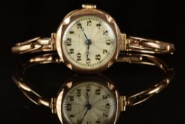 Collingwood 9ct gold ladies wristwatch with blued Breguet hands, black Arabic numerals, silver