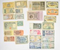 Collection of world banknotes including a 1961 Isle of Man 10 Shillings, a 1954 Gibraltar £1 and