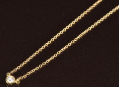 Tiffany & Co 18ct gold necklace set with a diamond of approximately 0.1ct by Elsa Peretti