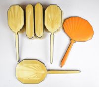 Art Deco hallmarked silver and yellow guilloché enamel dressing table set comprising hand mirror and