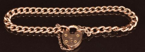 A 9ct rose gold curb link bracelet with 9ct gold heart padlock clasp, 9.4g, 18.5cm