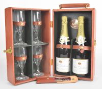 Papworth, Cambridge, England leather cased champagne picnic set, the case opening to reveal two 75cl