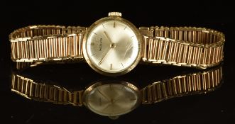Marvin 9ct gold ladies wristwatch with gold hands and hour markers, silver dial and signed 17