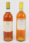 Two bottles of Sauternes comprising Chateau Suduiraut 1er Cru 1983 and Chateau Farluret 2010,