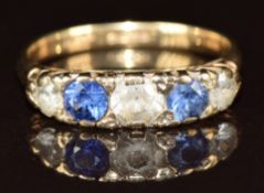 A 9ct gold ring set with sapphires and quartz, 2.3g, size L