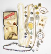 A collection of jewellery including yellow metal bangle (4.4g), two French paste buckles, three