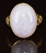 A 14k gold ring set with a lavender jadeite cabochon, size P, 7g