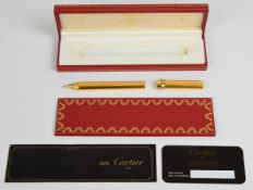 Must de Cartier Stylo Bille ballpoint pen with engraved gold plated body and cap and tri-colour