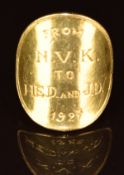 An 18ct gold ring set with a Victorian gold sovereign polished and engraved to read 'from N.V.K to