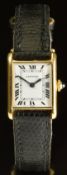 Cartier Tank 18ct gold ladies wristwatch with blued hands, black Roman numerals, white dial,