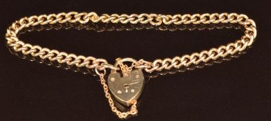 A 9ct gold curb link bracelet with heart padlock clasp, 11.7g, 18cm