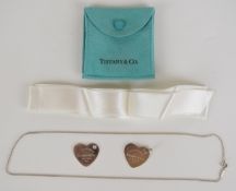 Tiffany & Co silver chain and two 'please return to Tiffany & Co' pendants