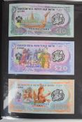 Collection of approximately 160 banknotes from Indochina and the Far East in an album, including