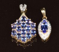 Two 9k gold pendants set with tanzanites and diamonds, 3.6g