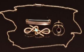 Edwardian 9ct rose gold pendant set with a garnet, 9ct rose gold chain, 9ct rose gold brooch and a