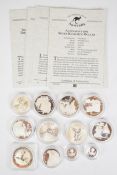 Twelve Australian silver commemorative coins, ten with certificates