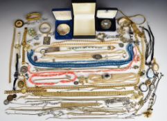 A collection of costume jewellery including coral necklace and earrings, Sarah Coventry pendants,