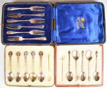 Three cased sets of hallmarked silver cutlery comprising set of six cake forks, part set of five