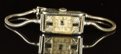 Art Deco 18ct gold ladies wristwatch with blued hands, black Arabic numerals, silver dial, diamond