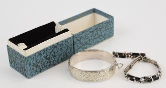 A hallmarked silver bangle and silver bracelet, 44g