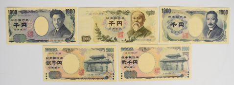 Five Japan 1000 and 2000 Yen banknotes comprising two 2000 Yen notes commemorating the 26th G8