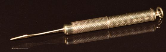 A 9ct gold toothpick with engine turned decoration, Birmingham 1979, 6g