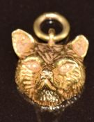 A 9ct gold pendant in the form of a fox's head, 5.7g