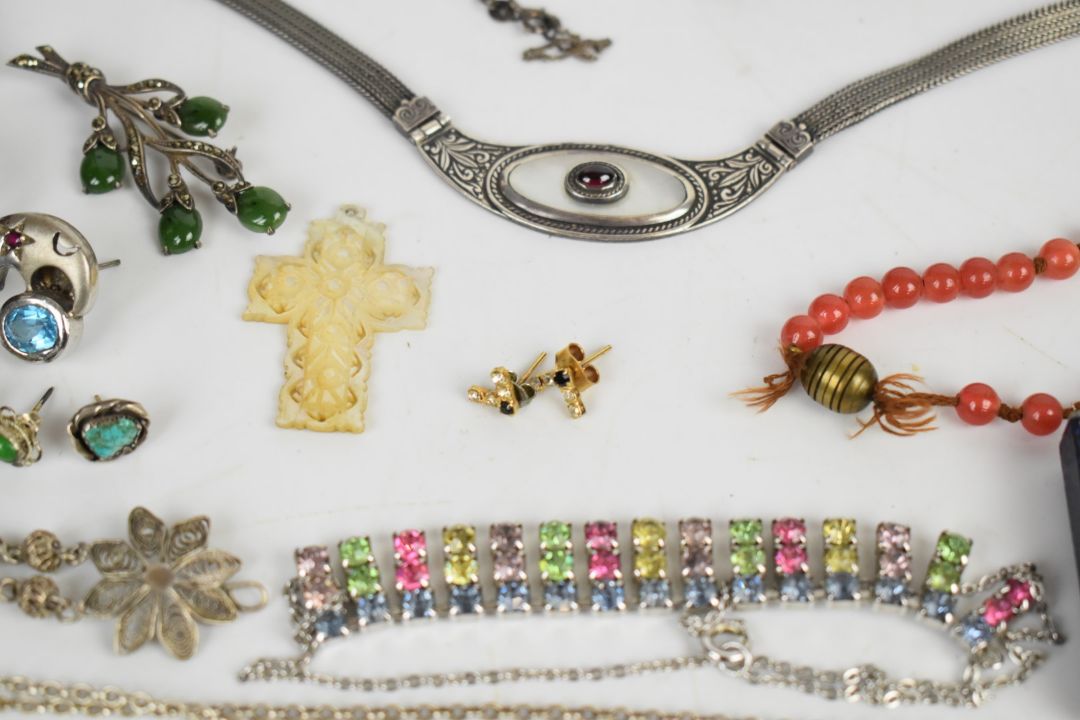 A collection of jewellery including two silver bangles, curb link bracelet with heart padlock clasp, - Image 8 of 8