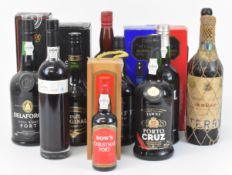 Twelve bottles of vintage Port and Sherry to include Taylor's, Croft Porto, Cockburn's, Dow's,