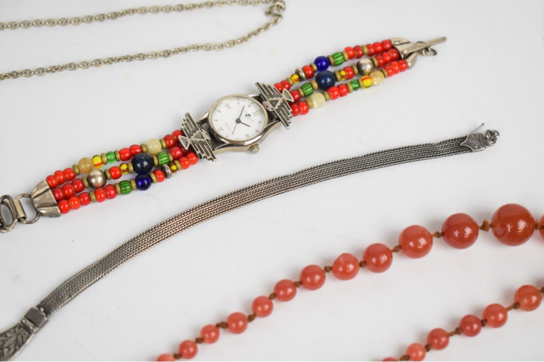 A collection of jewellery including two silver bangles, curb link bracelet with heart padlock clasp, - Image 7 of 8