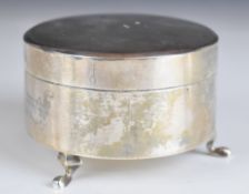 Chinese silver dressing table trinket box of plain circular form with engraved floral decoration