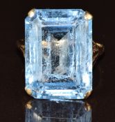 A 9ct gold ring set with an emerald cut synthetic spinel, 9g, size Q