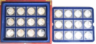 Cased set of 24 hallmarked silver medallions, each depicting a reigning monarch from William I to