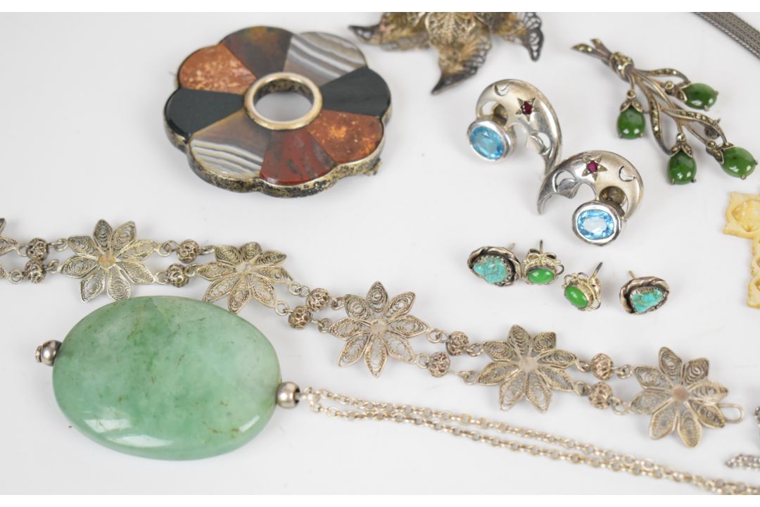 A collection of jewellery including two silver bangles, curb link bracelet with heart padlock clasp, - Image 4 of 8