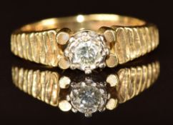 An 18ct gold ring set with a diamond, 4g, size J