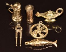 Six 9ct gold charms including lamp, articulated fish, postbox, stein and pliers, and a man with a