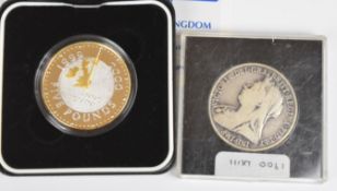 A wooden coin collector's case containing a small collection comprising British West Africa Edward