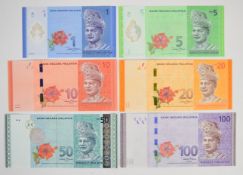 Six Malaysia 2012 issue polymer banknotes including 'AA' prefix 100 Ringgit