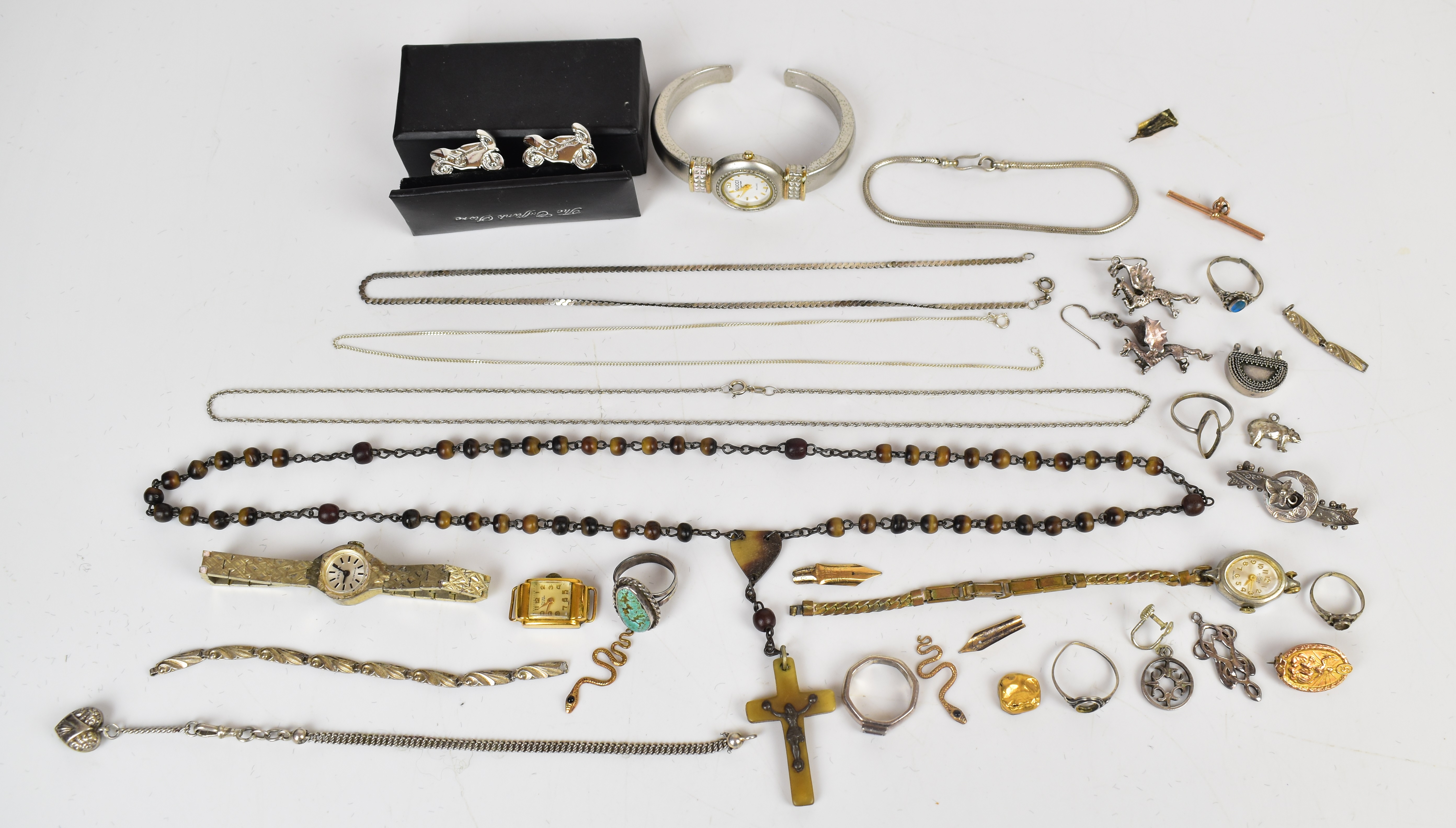 A collection of jewellery including silver ring set with turquoise, silver bracelet, silver