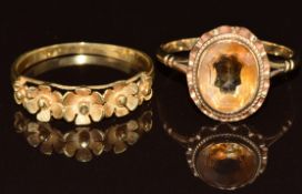 Two 9ct gold rings, one in the form of flowers and one set with quartz, 4.1g, size O