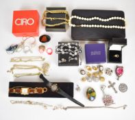 A collection of jewellery including Sarah Coventry brooch, Trifari ring, Swarovski earrings, Monet