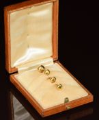 Four 9ct gold studs by Murle Bennett, in original tiered box, 2.8g